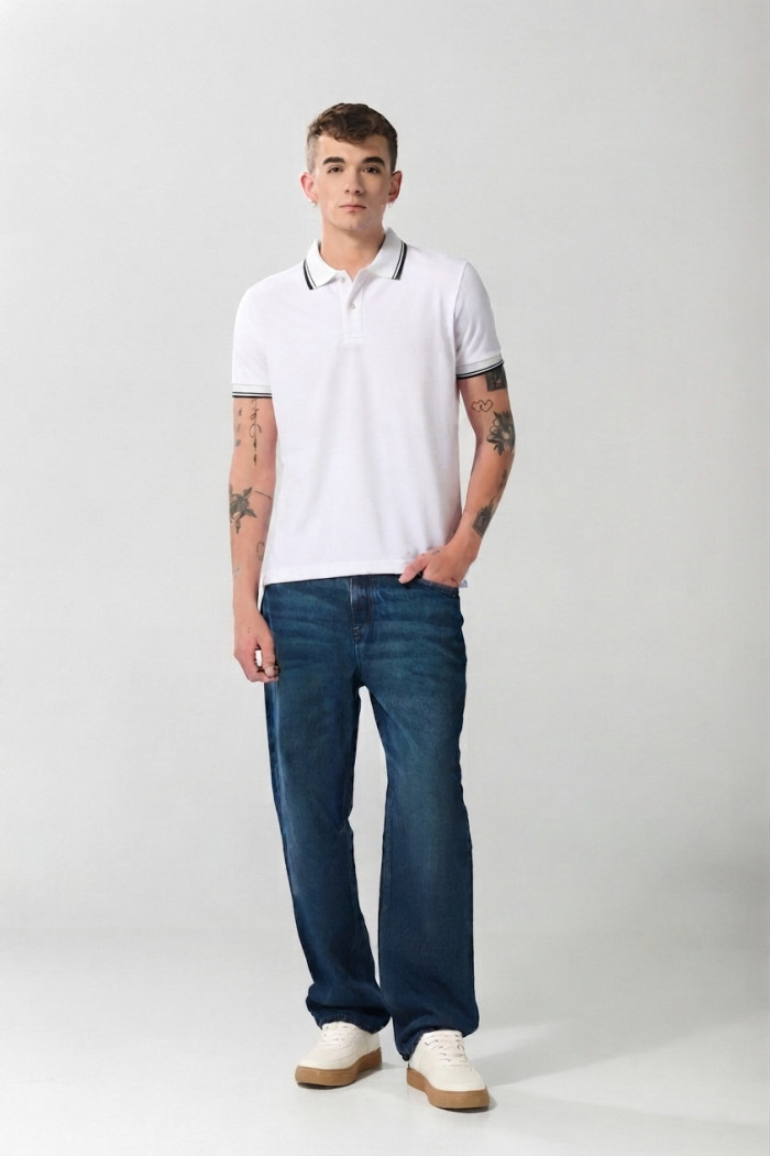 Camiseta polo infaltables manga corta unicolor con botones
