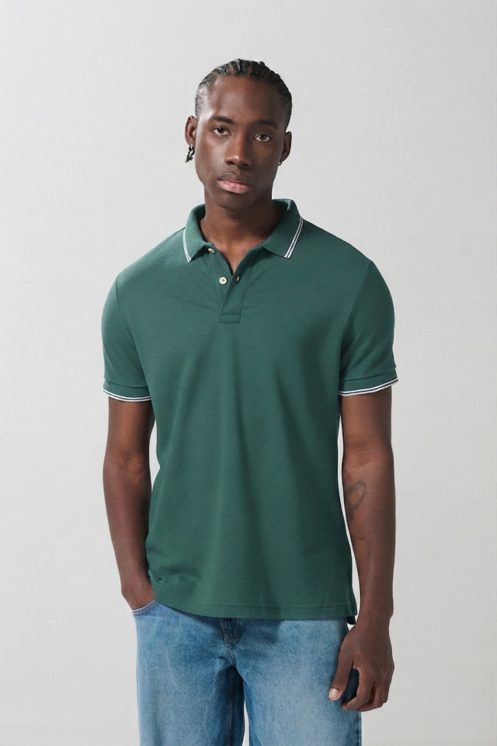 Camiseta polo infaltables manga corta unicolor con botones
