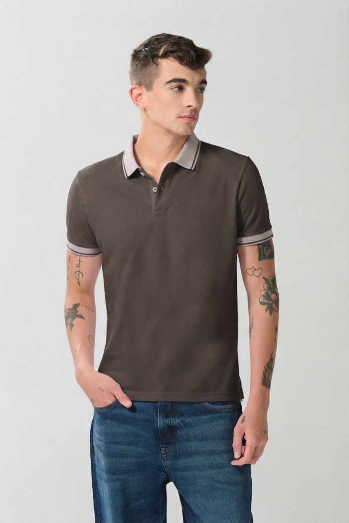 Camiseta polo infaltables manga corta unicolor con botones
