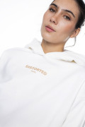Buzo oversize negro con capota, diseño y apliques metálicos
