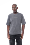 Camiseta estampada unicolor oversize con cuello redondo
