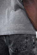 Camiseta estampada unicolor oversize con cuello redondo

