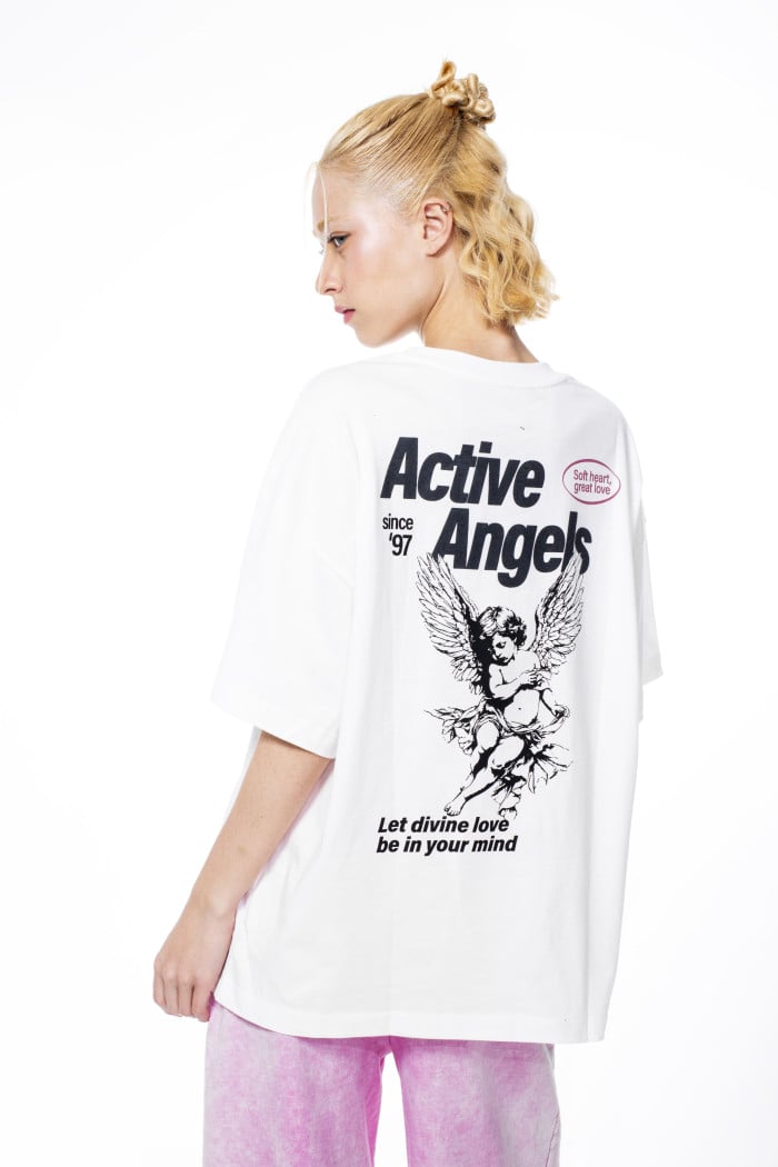 Camiseta crema clara oversize manga corta con diseños