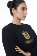 Buzo cuello redondo negro oversize de Carlos Vives
