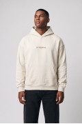 Buzo crema claro oversize con capota, bolsillo y textos
