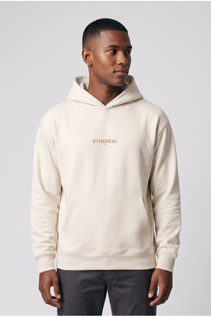 Buzo crema claro oversize con capota, bolsillo y textos
