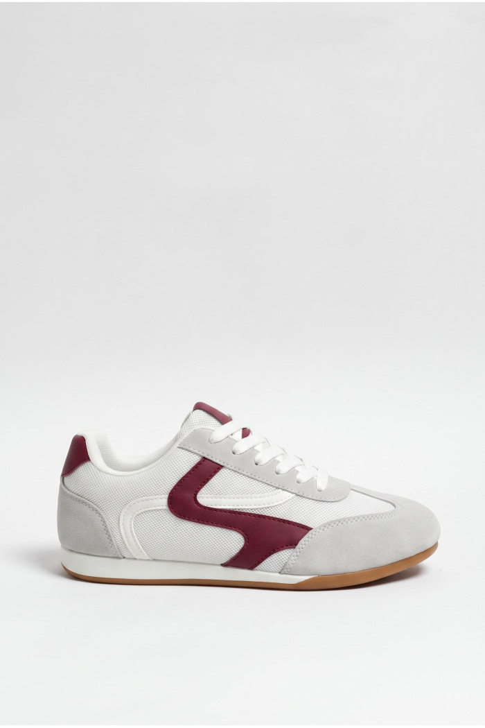 Tenis unicolores casuales con cordones y contrastes