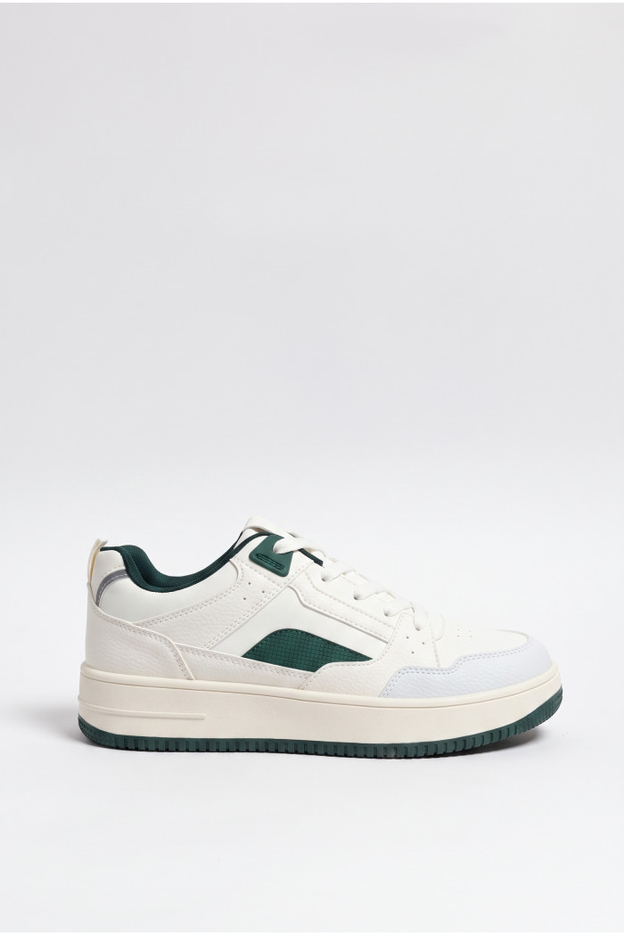 Tenis casuales unicolores de suelas planas con contrastes