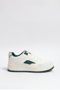 Tenis casuales unicolores de suelas planas con contrastes