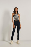 Jean jegging azul intenso con tiro súper alto y costuras