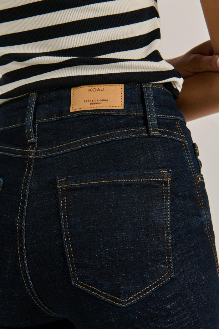 Jean jegging azul intenso con tiro súper alto y costuras