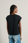 Camiseta unicolor manga sisa oversize con cuello redondo