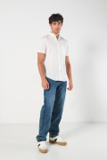 Camisa unicolor en algodón con cuello button down