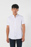 Camisa cuello nerú unicolor manga corta en algodón