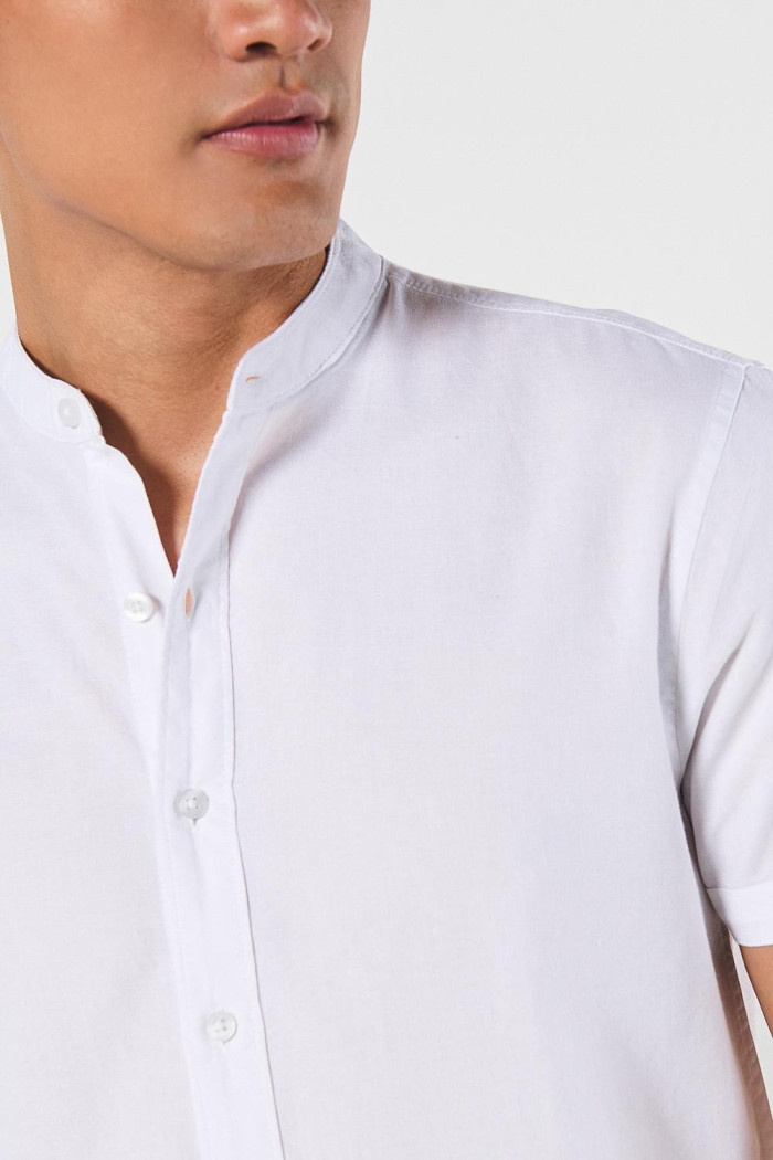 Camisa cuello nerú unicolor manga corta en algodón