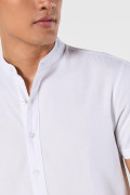 Camisa cuello nerú unicolor manga corta en algodón