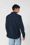 Camisa unicolor con cuello button down en algodón