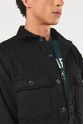 Sobrecamisa unicolor en paño con cuello trucker y bolsillos