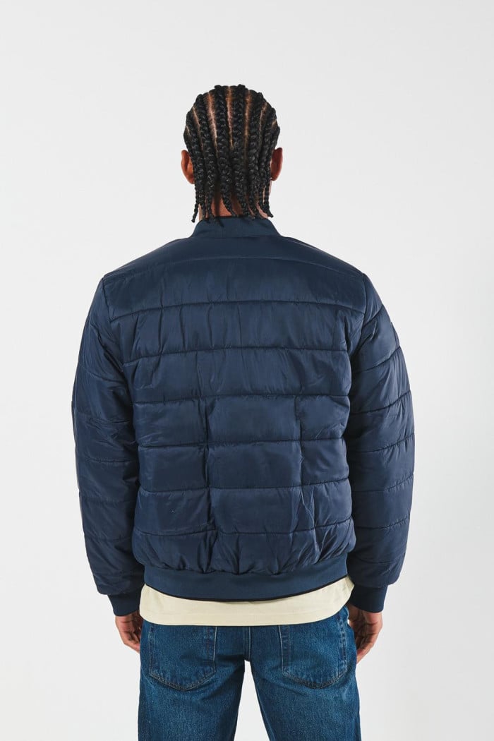 Chaqueta unicolor bomber acolchada con acabados en rib