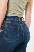 Jean jegging azul oscuro tiro súper alto con costuras cafés