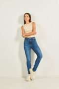 Jean súper tiro alto jegging azul con costuras cafés