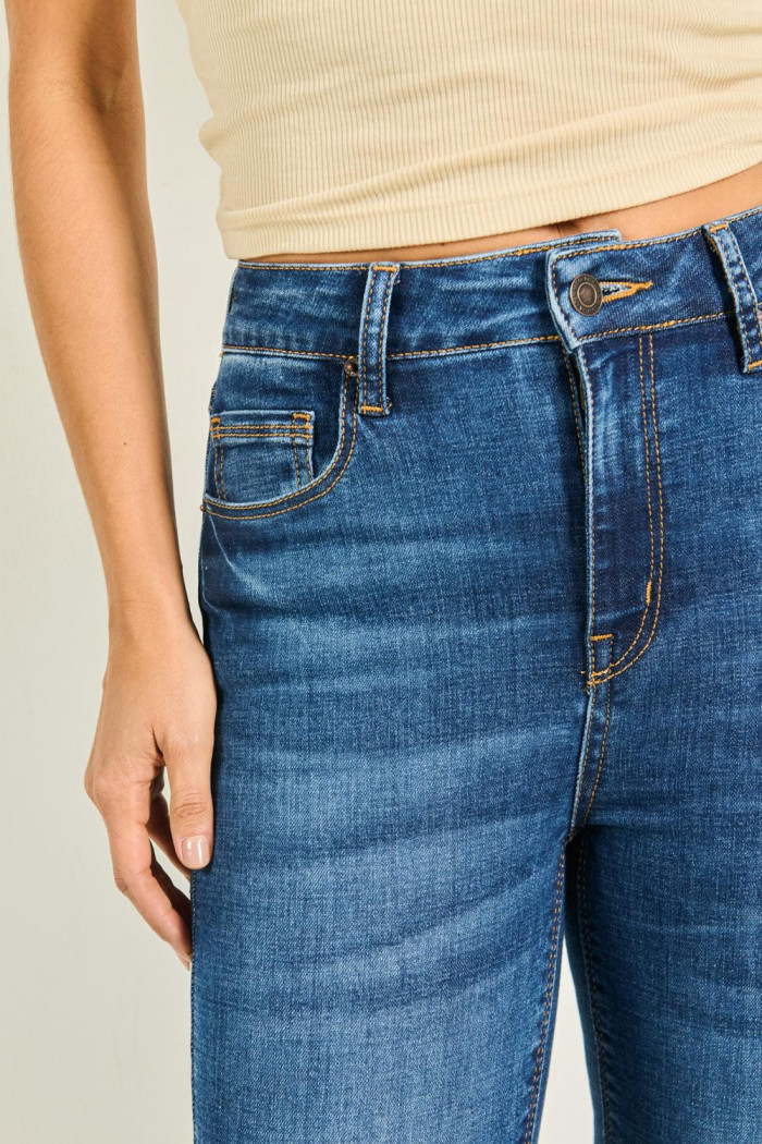 Jean súper tiro alto jegging azul con costuras cafés