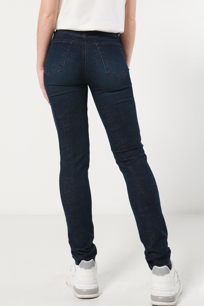 Jean azul intenso jegging ceñido con tiro alto y bolsillos