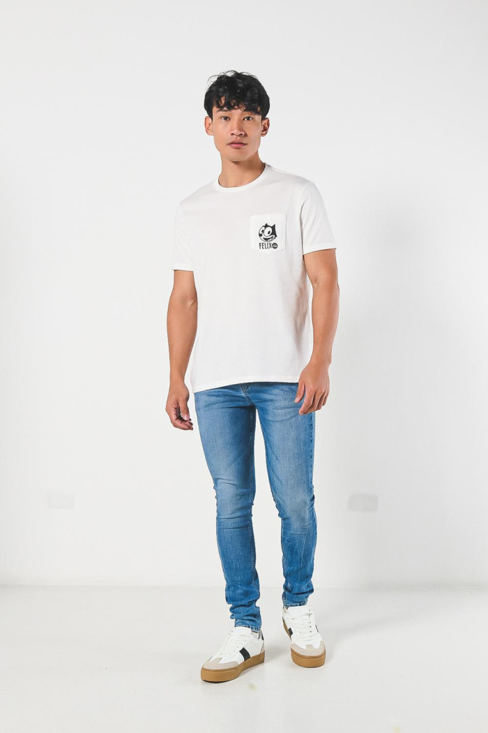 Camiseta de Félix el Gato crema con manga corta y bolsillo
