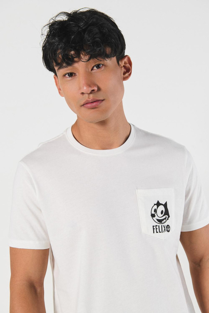 Camiseta de Félix el Gato crema con manga corta y bolsillo