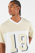 Camiseta college cuello V crema clara oversize