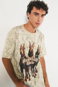 Camiseta unicolor oversize con arte de perros y manga corta