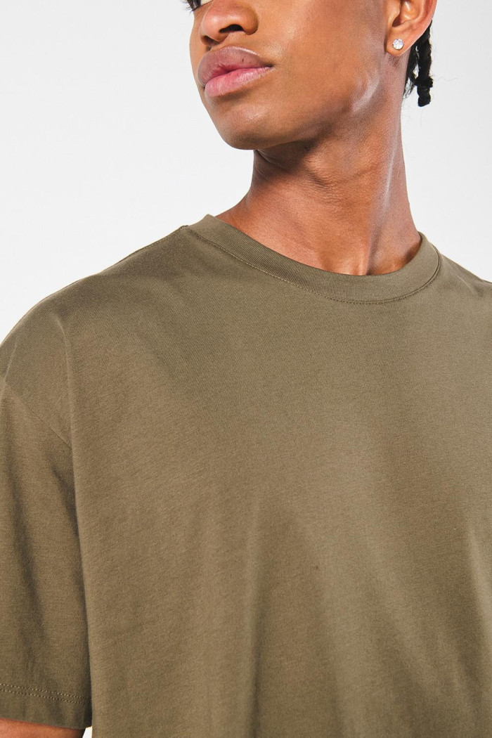 Camiseta verde manga corta oversize con diseño místico