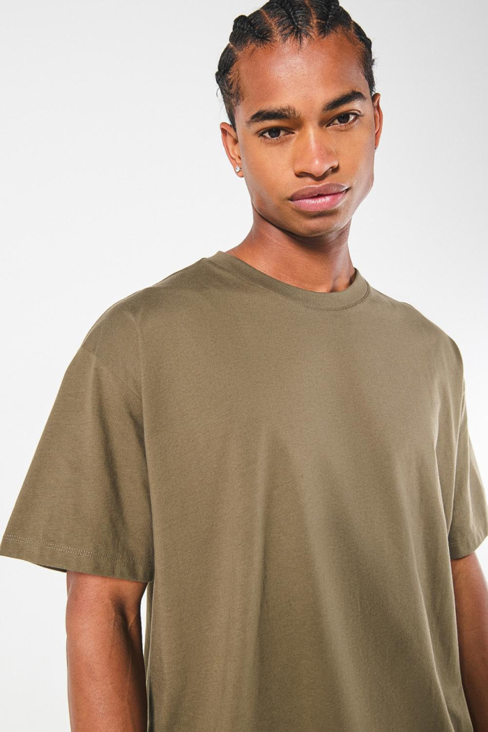 Camiseta verde manga corta oversize con diseño místico