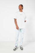 Camiseta oversize crema con motivo artístico y cuello redondo