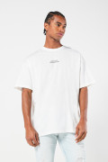 Camiseta oversize crema con motivo artístico y cuello redondo