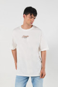 Camiseta manga corta oversize crema con textos estampados