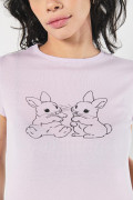 Camiseta en rib unicolor manga corta con diseño coquette