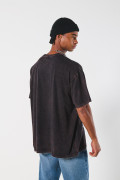 Camiseta negra oversize manga corta con diseño celestial