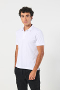 Camiseta unicolor polo con aberturas y manga corta