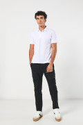 Camiseta unicolor polo con aberturas y manga corta