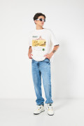 Jean azul claro tipo 90´S con bota recta y tiro bajo