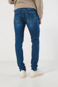 Jean tiro bajo skinny azul con ajuste ceñido y desgastes