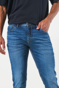 Jean skinny tiro bajo azul con ajuste ceñido y cremallera
