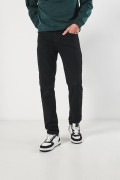 Jean slim ajustado negro con bolsillos y tiro bajo