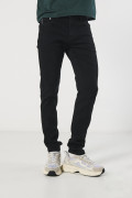 Jean negro skinny con bolsillos, tiro bajo y ajuste ceñido