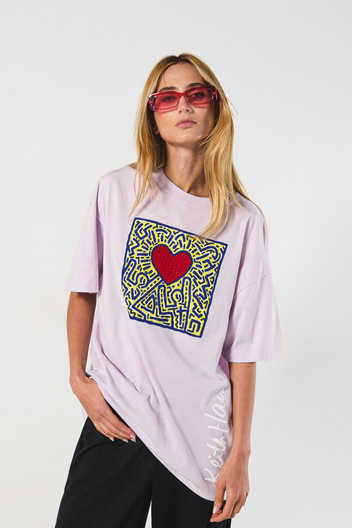 Camiseta oversize lila manga corta con arte de Keith Haring