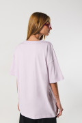 Camiseta oversize lila manga corta con arte de Keith Haring