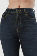 Jean jegging azul ajustado con tiro súper alto y bolsillos