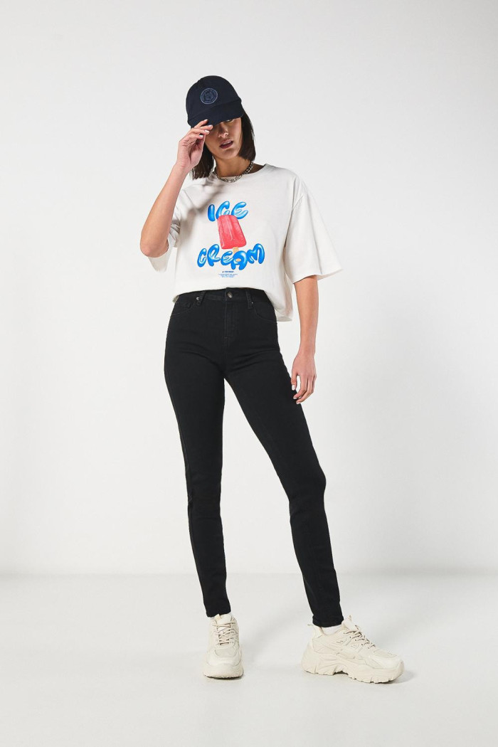 Jean jegging tiro alto negro ceñido con bolsillos