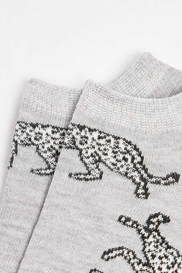 Medias tobilleras unicolores con diseños de animal print